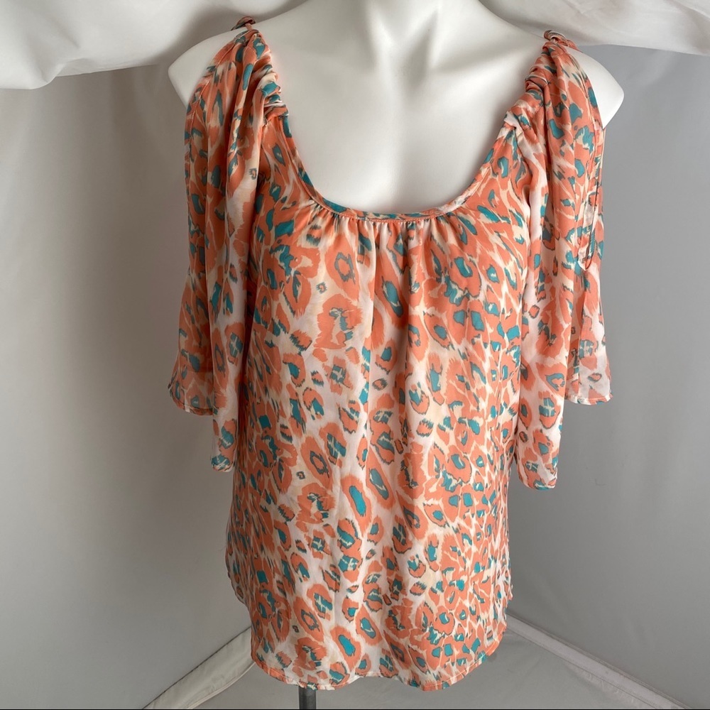 Lovers and Friends peach and teal animal print cold shoulder cutout tunic
